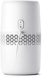 Arrière d'un humidificateur d'air Philips blanc avec boutons de commande et motif décoratif.