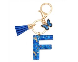 Blauwe letter F sleutelhanger met kwastje en vlinder – sleutelhanger voor dames – goudkleurige metalen keychain met acryl initiaal F hanger, decoratieve bedel en tassel