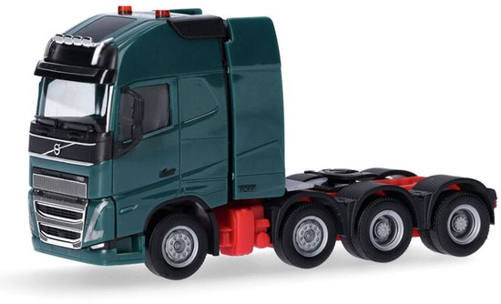 Donkergroene Volvo FH16 XL truck met rode chassisdetails.
