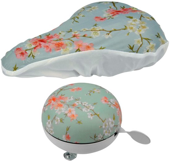 Set met zadeldekje en fietsbel, beide met lichtblauwe achtergrond en bloemenprint.