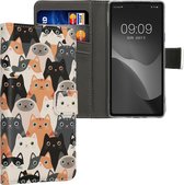 kwmobile telefoonhoesje geschikt voor Google Pixel 7a - Backcover voor smartphone - Hoesje met pasjeshouder in oranje / zwart / wit - Katten design