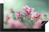 KitchenYeah® Inductie beschermer 81.6x52.7 cm - Bladeren van een roze tulp met een turquoise achtergrond - Kookplaataccessoires - Afdekplaat voor kookplaat - Inductiebeschermer - Inductiemat - Inductieplaat mat