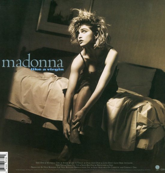 Madonna in slipjurk zit op bed, met de tekst 'madonna like a virgin' en tracklist.