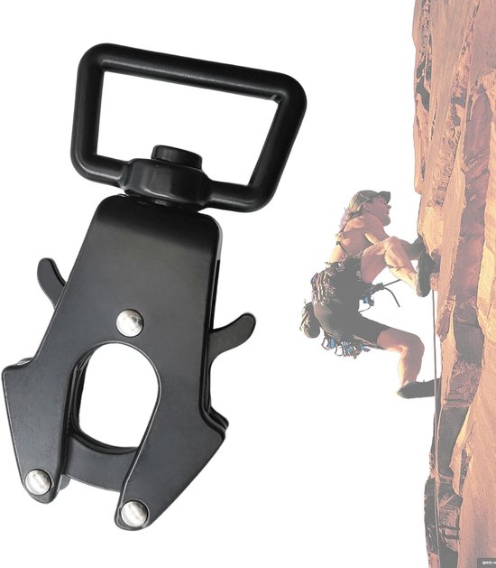 Zwarte kikkerclip in de hand, met een klimmer op een rotswand op de achtergrond.