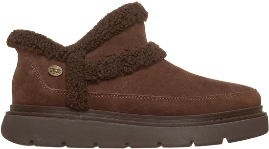 Bruine suède enkelboot met imitatiebont, dikke zool en Skechers Slip-ins logo aan de zijkant.