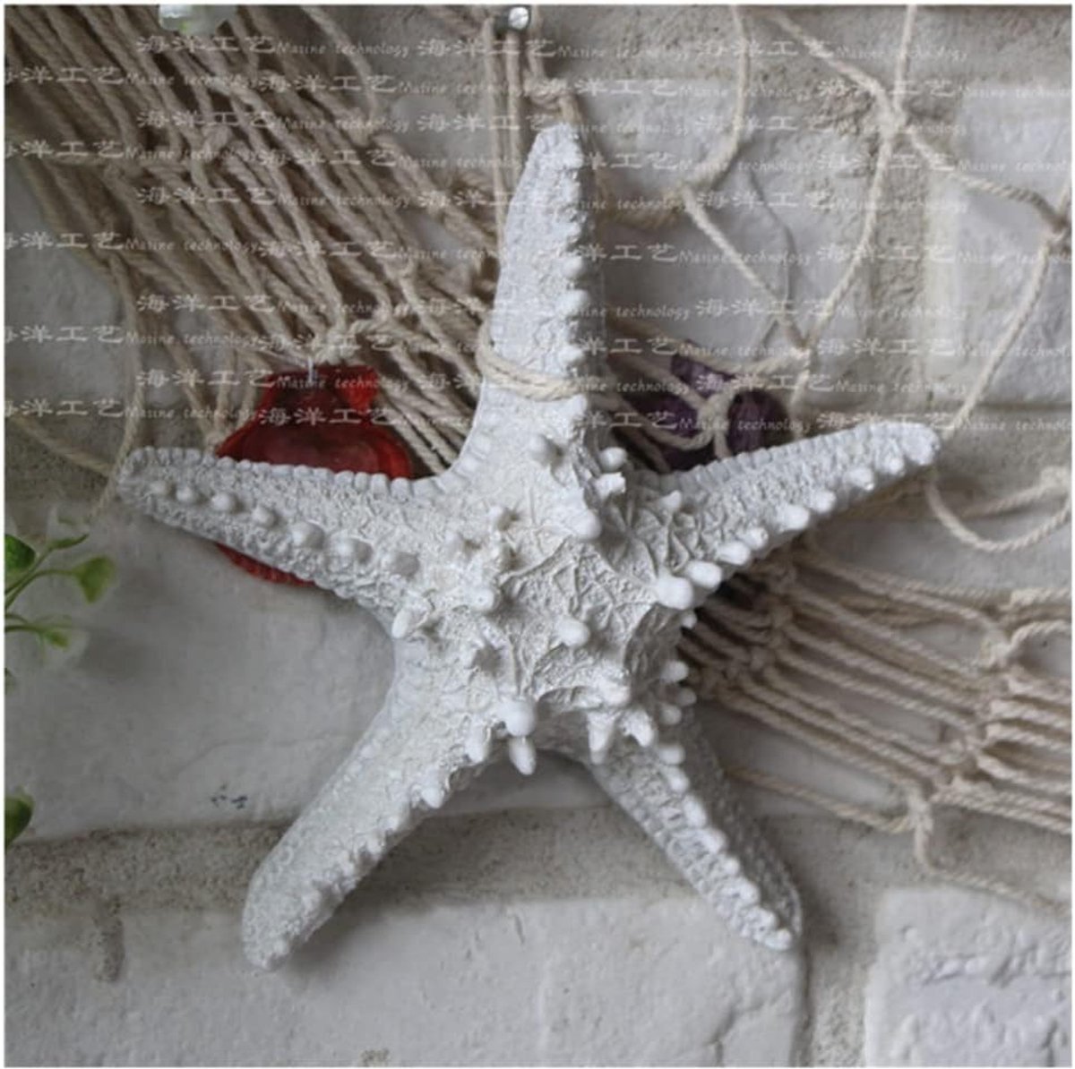 Wanddecoratie zeesterren 22cm maritieme mediterrane stijl hangdecoratie bont hars groot zeester wit