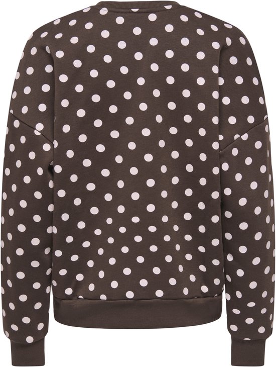 Achterkant van een bruine sweater met witte polkadots.