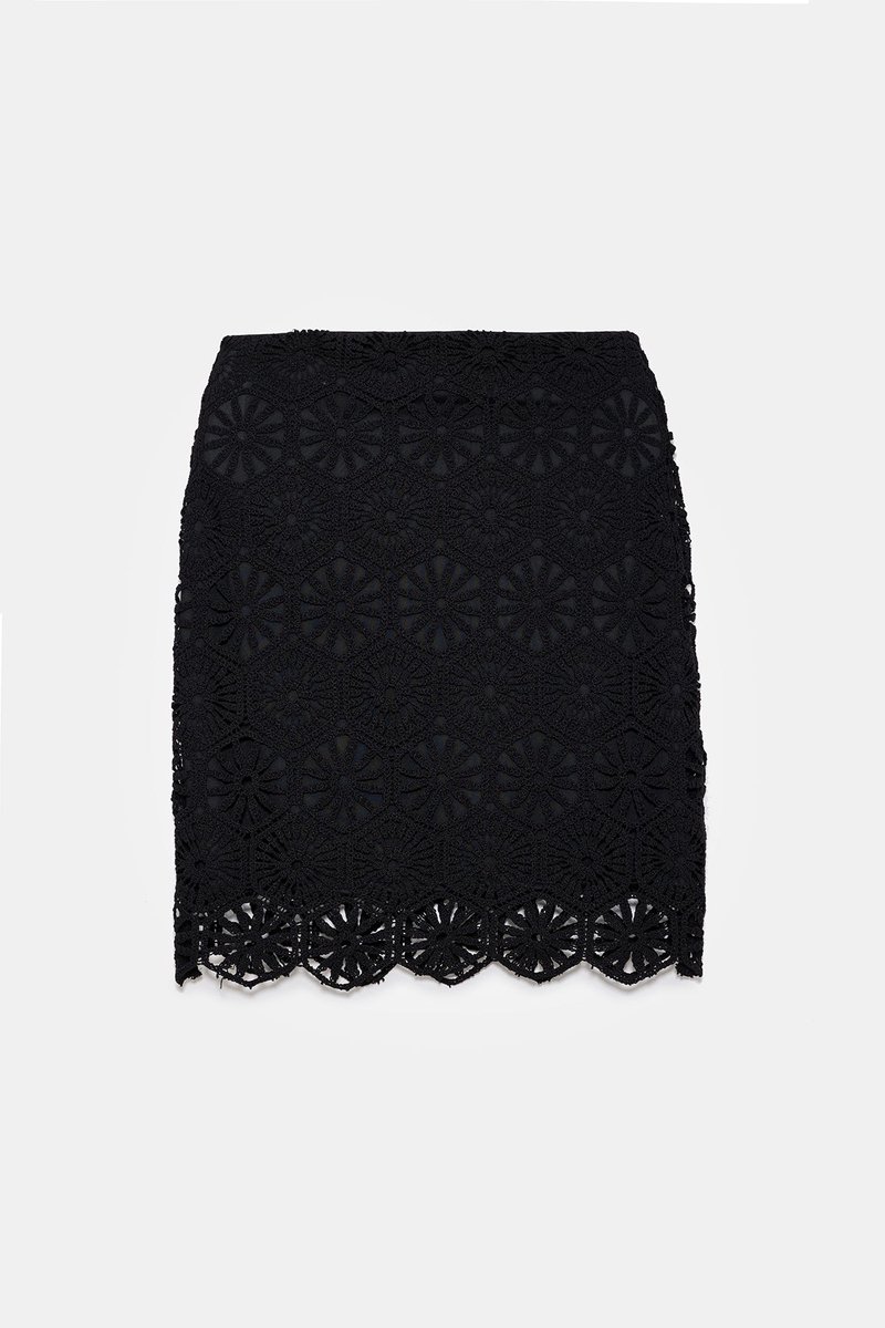 Mini-jupe en dentelle doublée