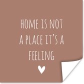 Poster Engelse quote "Home is not a place it's a feeling" met een hartje tegen een bruine achtergrond - 30x30 cm