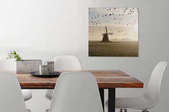 Tableau sur toile Oies au-dessus d'un moulin à vent aux Nederland - 50x50 cm - Décoration murale