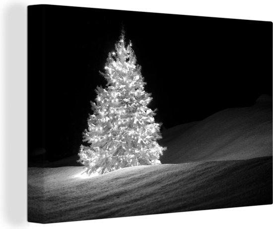 Canvas Schilderij Een verlichtte kerstboom tijdens de nacht - zwart wit - 60x40 cm - Wanddecoratie