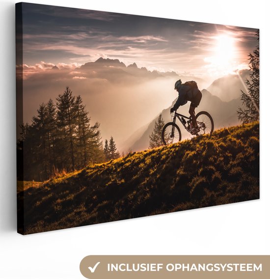 Canvas schilderij - Foto op doek - Landschap - Fiets - Bergen - Zon - Bomen - Muurdecoratie - 60x40 cm - Canvas doek