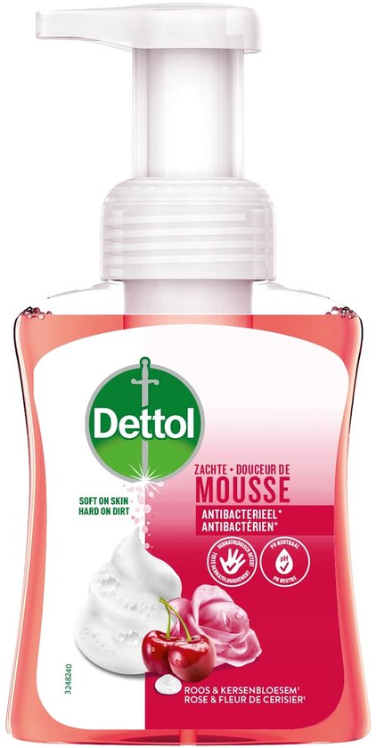 Dettol zachte mousse handzeep in een doorzichtige fles met roze inhoud en een afbeelding van kersen en rozen.