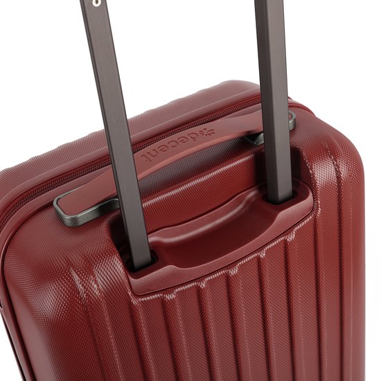 Poignée rétractable avec le logo Decent sur une valise rouge.