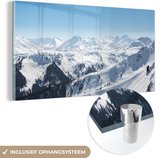 MuchoWow® Glasschilderij 80x40 cm - Schilderij acrylglas - Besneeuwde bergtoppen in de Alpen - Foto op glas - Schilderijen