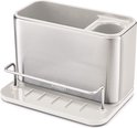 Zilverkleurige Joseph Joseph gootsteen organizer op een witte basis met ribbels.