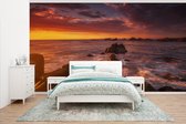 Behang - Fotobehang Een zonsondergang boven Big Sur in Amerika - Breedte 465 cm x hoogte 260 cm