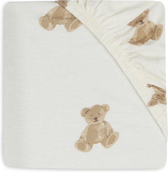Drap de lit crème avec un imprimé intégral d'ours en peluche marron.