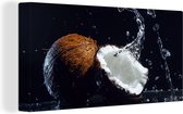 Canvas schilderij 160x80 cm - Wanddecoratie Kokosnoot - Stilleven - Water - Zwart - Fruit - Muurdecoratie woonkamer - Slaapkamer decoratie - Kamer accessoires - Schilderijen