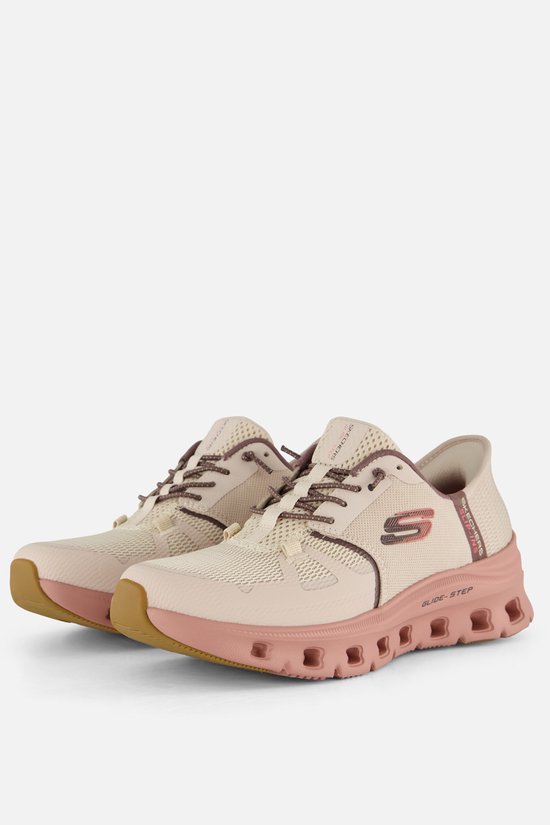 Paire de sneakers couleur naturelle avec semelles roses, matière mesh et accents violets.