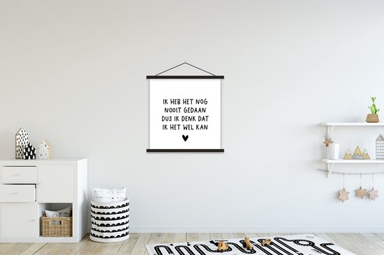 Wanddecoratie met tekst: 'Ik heb het nog nooit gedaan dus ik denk dat ik het wel kan' met een hartje, in een kinderkamer.