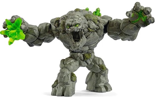 Woedend stenen monster figuur met groene kristallen in zijn vuist, met geopende mond en groene ogen.