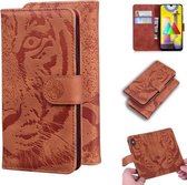 Voor Samsung Galaxy M31 Tiger Embossing Pattern Horizontale Flip lederen tas met houder & kaartsleuven & portemonnee (bruin)