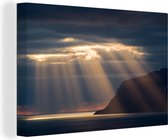 Canvas Schilderij De zonnestralen vanuit de donkere wolken - 30x20 cm - Wanddecoratie