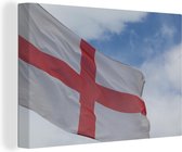 Canvas Schilderij De Engelse vlag in wappert in de lucht - 180x120 cm - Wanddecoratie XXL
