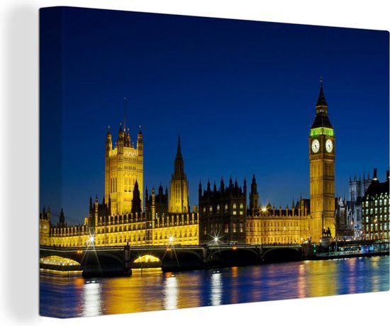 Canvas schilderij 140x90 cm - Wanddecoratie De Big Ben in de avond verlicht in Londen - Muurdecoratie woonkamer - Slaapkamer decoratie - Kamer accessoires - Schilderijen