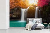 Behang - Fotobehang Kleurrijke watervallen in het Thaise Nationaal park Na Haew - Breedte 420 cm x hoogte 280 cm