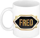 Fred naam cadeau mok / beker met gouden embleem - kado verjaardag/ vaderdag/ pensioen/ geslaagd/ bedankt