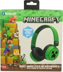 Minecraft draadloze koptelefoon in groen en zwart met Creeper-print, in de verpakking.