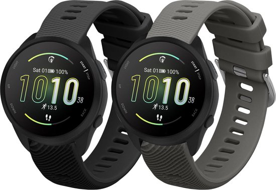 Deux montres de sport, une avec bracelet noir et une avec bracelet gris, avec écran rond.