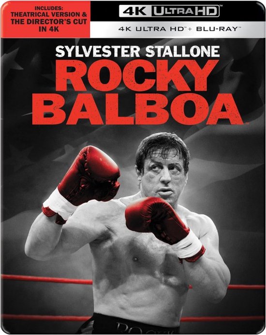 Sylvester Stallone als Rocky Balboa met bokshandschoenen aan, in de ring.
