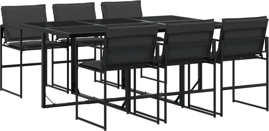 Zwarte tuintafel met vier stoelen.