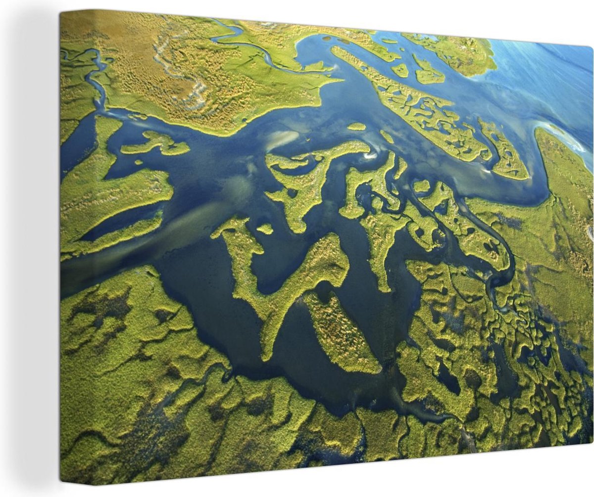 Canvas Schilderij Groene eilanden in de zee - 60x40 cm - Wanddecoratie - OneMillionCanvasses