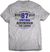 87 Jaar Legend - Feest kado T-Shirt Heren / Dames - Antraciet Grijs / Donker Blauw - Perfect Verjaardag Cadeau Shirt - grappige Spreuken, Zinnen en Teksten. Maat L