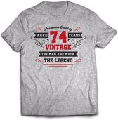 74 Jaar Legend - Feest kado T-Shirt Heren / Dames - Antraciet Grijs / Rood - Perfect Verjaardag Cadeau Shirt - grappige Spreuken, Zinnen en Teksten. Maat M