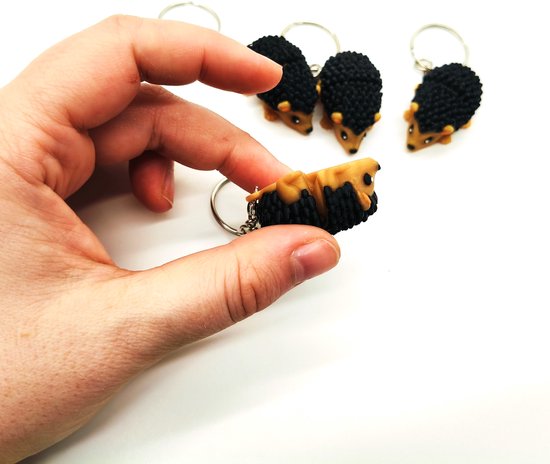 Porte-clés hérisson mignon - Design animal articulé et flexible, joli cadeau pour les amoureux des animaux, parfait pour les sacs à dos ou les clés