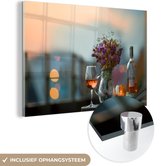 MuchoWow® Glasschilderij 60x40 cm - Schilderij acrylglas - Dure drank bij zonsondergang - Foto op glas - Schilderijen