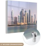 MuchoWow® Glasschilderij 90x90 cm - Schilderij acrylglas - Dubai - Water - Skyline - Foto op glas - Schilderijen