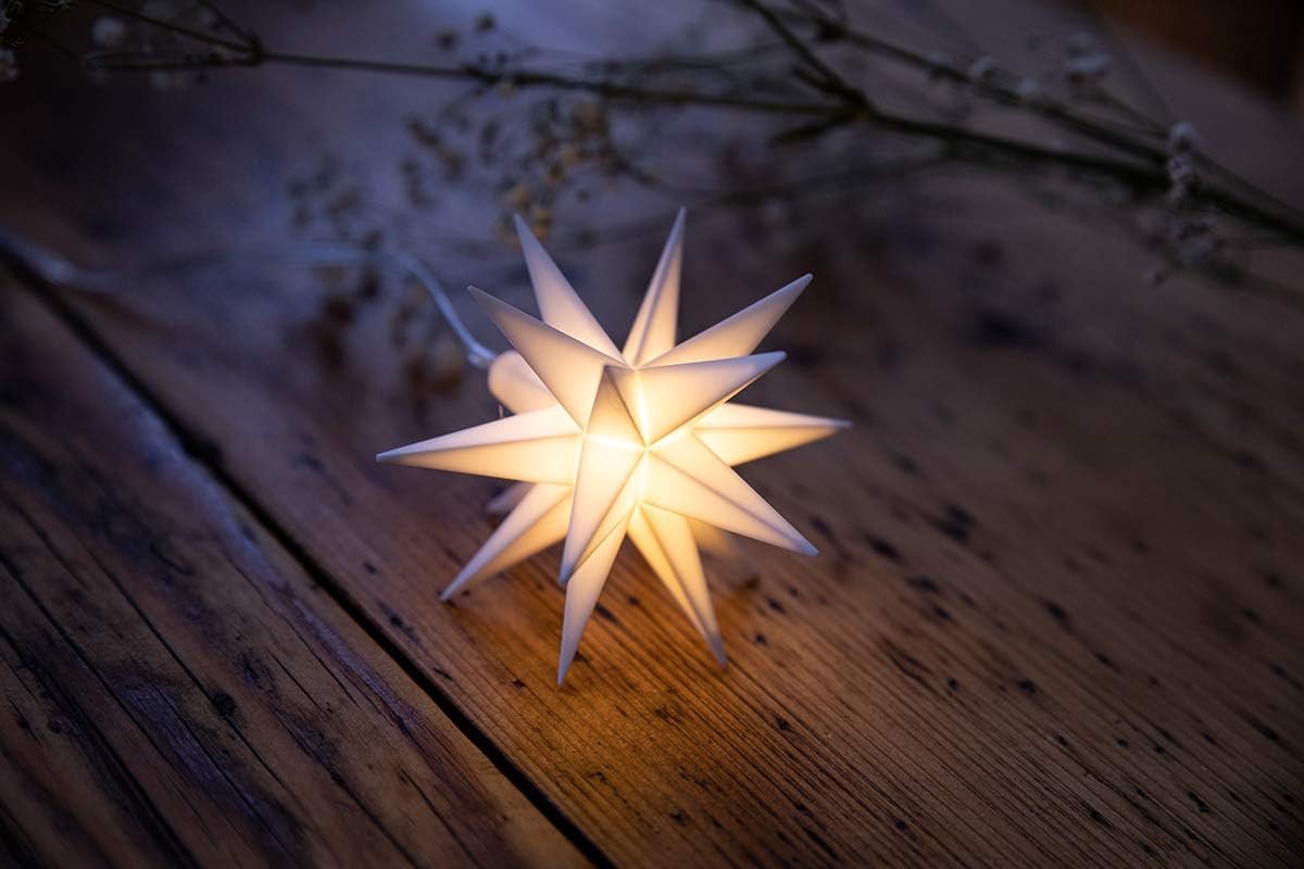 Novaliv Kerstster LED decoratieve ster klein 8cm wit met batterijvak voor 3 AA batterijen 6u timerfunctie (1,5m kabel) binnenin DECORATIE 3D ster 18-puntige verlichte ster LED kerstster verlicht zwart