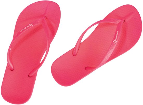 Fuchsia Ipanema teenslippers met patroon op de zool.