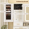 Intérieur de l'armoire à bijoux avec de nombreux compartiments pour boucles d'oreilles, bagues, colliers et bracelets.