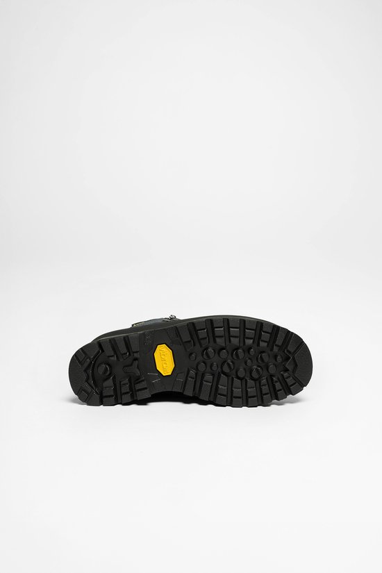 Zool van een blauwe wandelschoen met VIBRAM-logo.