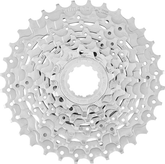 Zilverkleurige Shimano cassette met 9 tandwielen, elk met kleine ronde uitsparingen.