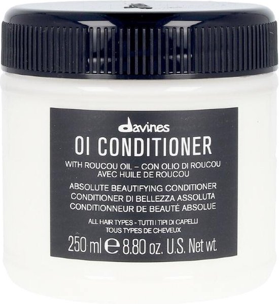 Pot de revitalisant Davines OI avec couvercle noir, contient 250 ml.
