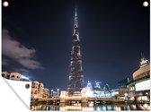 Muurdecoratie buiten De Burj Khalifa in Dubai in de nacht - 160x120 cm - Tuindoek - Buitenposter