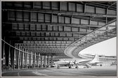 JUNIQE - Poster met kunststof lijst Airplane Hangar -13x18 /Grijs